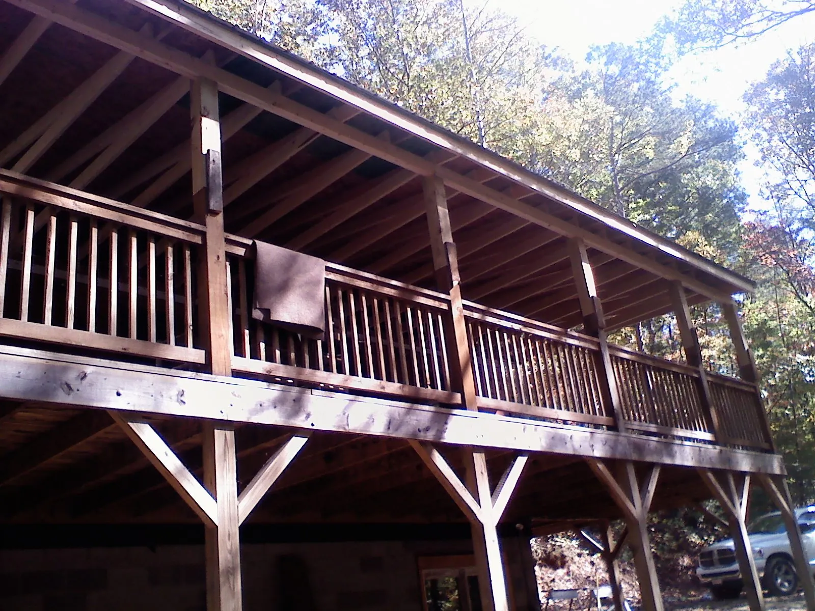 Timber framing under a new elevated porch and deck — Roof Leak Repair in Axtell by Roofing Brothers